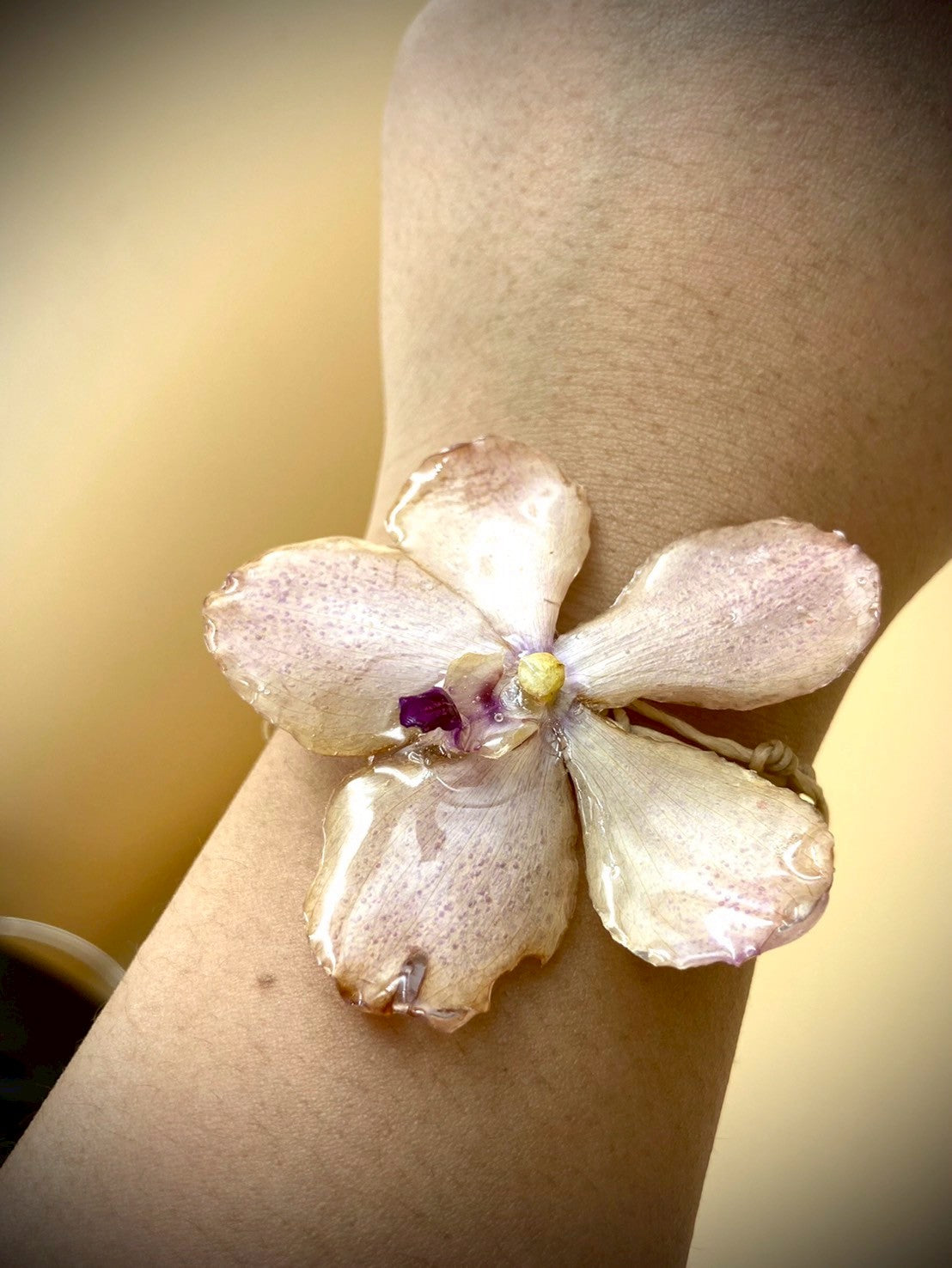 Bracelet made from real flowers, light brown rope