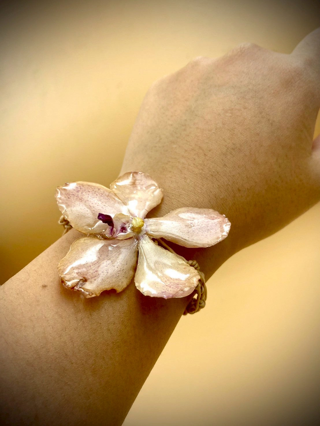 Bracelet made from real flowers, light brown rope