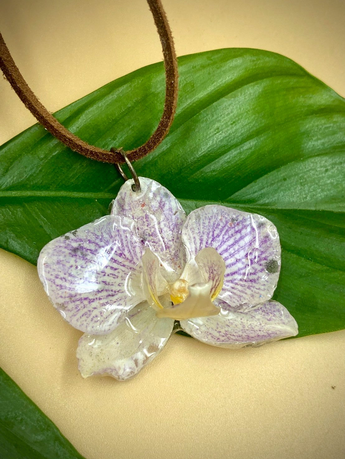 Pendant + necklace made from real orchids