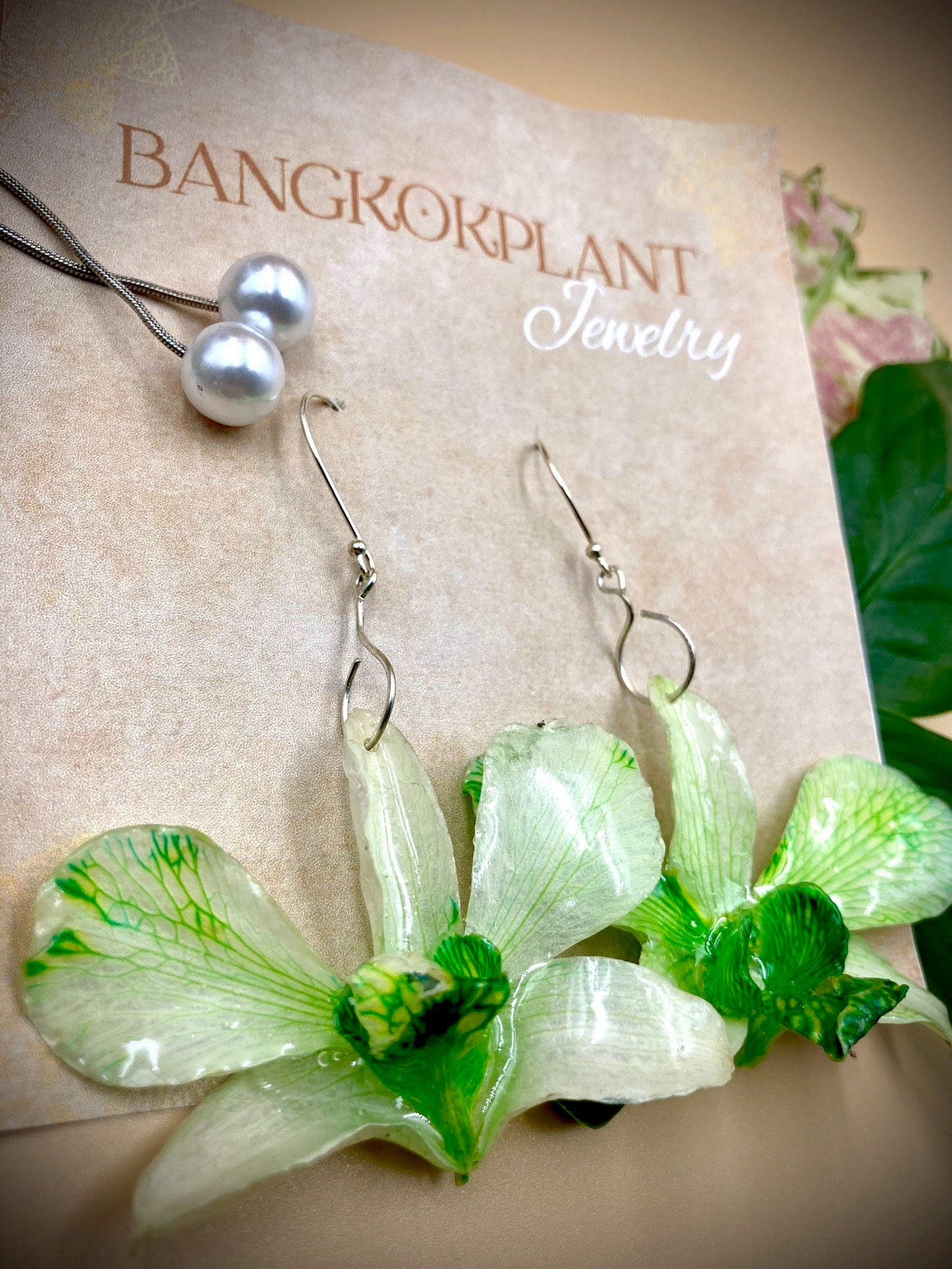 Earrings made from real flowers in green tones