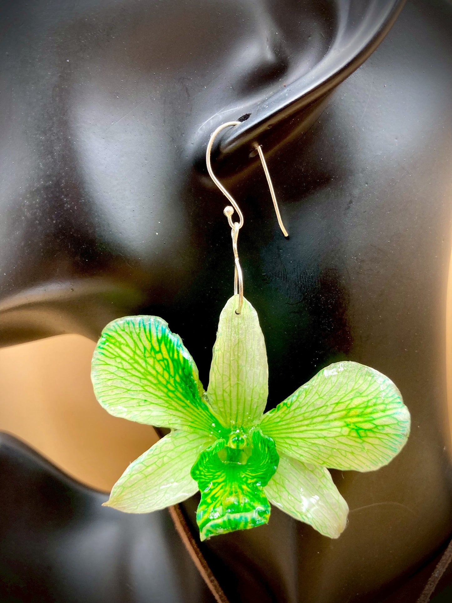 Earrings made from real flowers in green tones