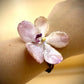 Bracelet made from real orchids, dark brown string