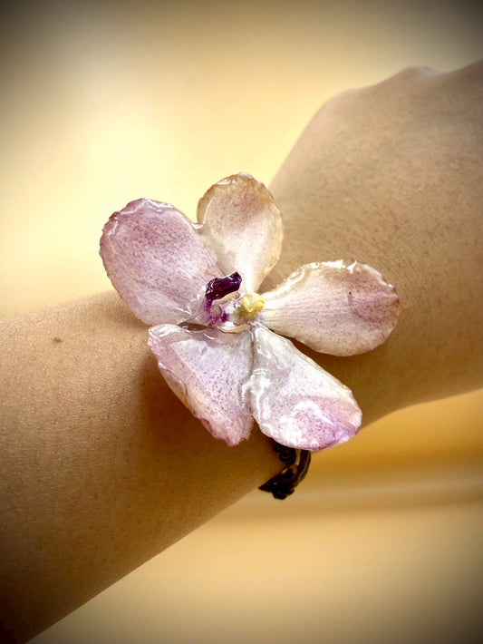 Bracelet made from real orchids, dark brown string