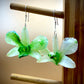 Earrings made from real flowers in green tones