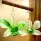 Earrings made from real flowers in green tones